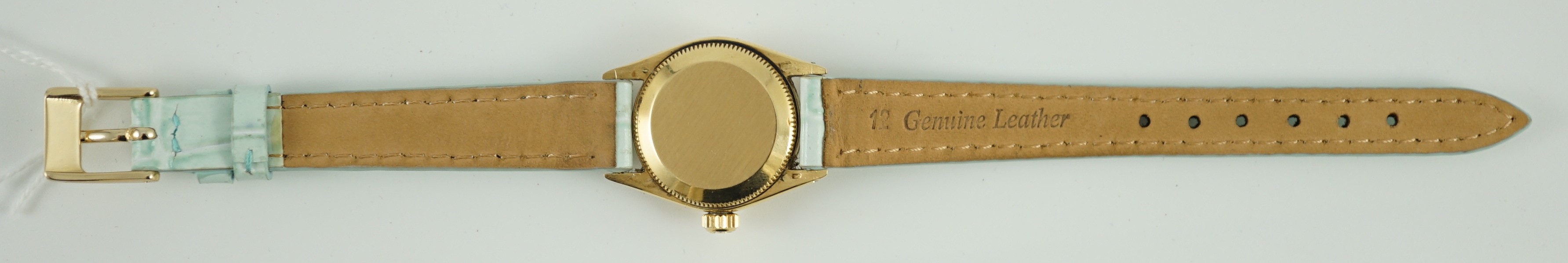 A lady's 18ct gold Rolex Oyster Perpetual wrist watch, on associated leather strap